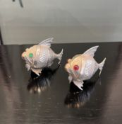 A PAIR OF SPANISH SILVER FISH SALT AND PEPPER SHAKERS