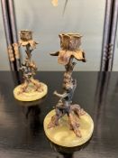 A PAIR OF 19TH CENTURY GILT AND PATINATED BRONZE FIGURAL CANDLESTICKS
