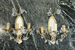 A PAIR OF FRENCH ORMOLU AND CUT GLASS MIRRORED WALL LIGHTS