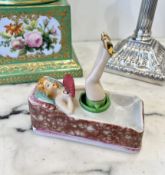 A VINTAGE JAPANESE PORCELAIN 'NODDING' PIN UP GIRL