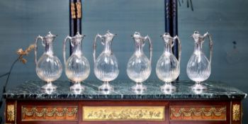 A SET OF SIX LATE 19TH / EARLY 20TH CENTURY FRENCH SILVER AND GLASS CLARET JUGS BY E. LEFEBVRE