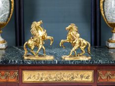 A PAIR OF 19TH CENTURY FRENCH GILT BRONZE MODELS OF THE MARLEY HORSES