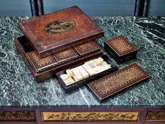A LATE 19TH CENTURY CHINESE LACQUERED GAMING SET