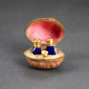 A RARE PAIR OF 19TH CENTURY MINIATURE NOVELTY SCENT BOTTLES HOUSED IN A REAL WALNUT