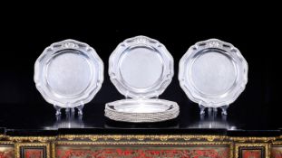 A SET OF TWELVE GEORGE III STERLING SILVER DINNER PLATES FROM THE DUTTON SERVICE C. 1768