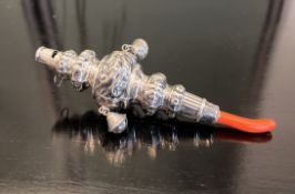A SILVER BABY'S RATTLE WITH WHISTLE