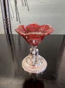 A FRENCH SILVER AND CRANBERRY GLASS MINIATURE VASE