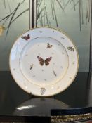 A 19TH CENTURY FRENCH PARIS PORCELAIN PLATE DECORATED WITH BUTTERFLIES