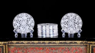 A SET OF TWELVE STERLING SILVER AND GLASS TRIVETS BY WEBSTER, AMERICAN