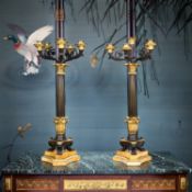 AN IMPRESSIVE PAIR OF EARLY 19TH CENTURY EMPIRE GILT AND PATINATED BRONZE CANDELABRA