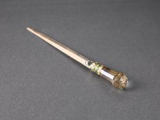 A SOLID GOLD, CITRINE AND ENAMELLED PAPER KNIFE
