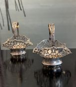 A PAIR OF ENGLISH STERLING SILVER SWEETMEAT BASKETS C. 1927