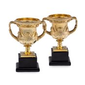 ASPREY: A PAIR OF SOLID STERLING SILVER GILT WARWICK VASES C. 1914