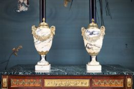 A PAIR OF EARLY 20TH CENTURY FRENCH MARBLE AND ORMOLU VASES AND COVERS
