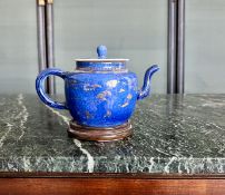 A KANGXI PERIOD 18TH CENTURY BLUE GLAZED TEAPOT