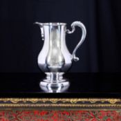 A STERLING SILVER BEER JUG BY GARRARD & CO. LTD. LONDON C. 1970