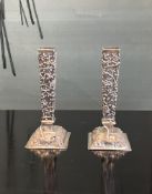 A PAIR OF LATE 19TH CENTURY CHINESE EXPORT SILVER BUD VASES
