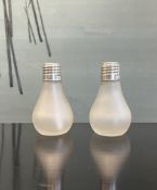 A PAIR OF STERLING SILVER NOVELTY SALT AND PEPPER SHAKERS IN THE FORM OF LIGHT BULBS BY C.J. VANDER