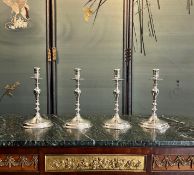 A SET OF FOUR STERLING SILVER CANDLESTICKS, LONDON, 1931, CRICHTON BROTHER