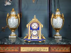 A 19TH CENTURY FRENCH PORCELAIN AND ORMOLU MANTEL CLOCK
