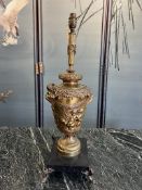 A 19TH CENTURY FRENCH GILT BRONZE LAMP BASE AFTER CLODION