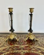 A PAIR OF LATE 19TH CENTURY GILT AND PATINATED BRONZE CANDLESTICKS