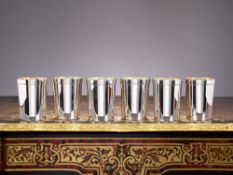 A SET OF SIX STERLING SILVER AND SILVER GILT BEAKERS, LONDON, C. 1987