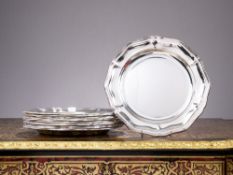 A SET OF TWELVE SILVER UNDER PLATES BY CALEGARO, ITALY