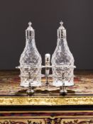 A RARE GEORGE I SILVER AND GLASS CRUET SET C. 1724, SIMON PANTIN II