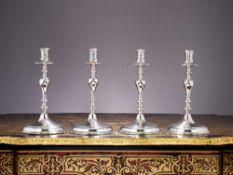 A SET OF FOUR STERLING SILVER CANDLESTICKS, LONDON, 1931, CRICHTON BROTHER