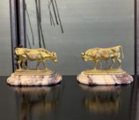 ISIDORE JULES BONHEUR (FRENCH, 1827-1901): A PAIR OF GILT BRONZE MODELS OF A BULL AND COW