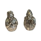 A PAIR OF PUNCH AND JUDY SALT AND PEPPER SHAKERS