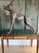 A LIFE-SIZE BRONZE MODEL OF A BOXER DOG