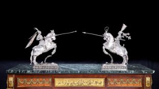 A LARGE PAIR OF STERLING SILVER MODELS OF JOUSTING KNIGHTS CIRCA 1900