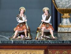 A RARE PAIR OF 19TH CENTURY PARIS PORCELAIN FIGURAL SCENT BOTTLES MODELLED AS SCOTTISH HIGHLANDERS