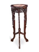 A LATE 19TH / EARLY 20TH CENTURY CHINESE CARVED HARDWOOD AND MARBLE STAND