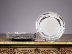 A SET OF TWELVE GEORGE III STERLING SILVER DINNER PLATES FROM THE DUTTON SERVICE C. 1768