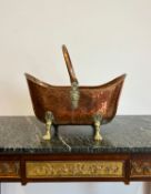 A 19TH CENTURY COPPER AND BRASS LOG BASKET