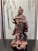 A JAPANESE CARVED HARDWOOD FIGURE OF A WARRIOR