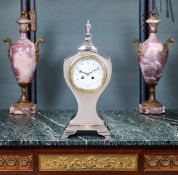 A LARGE STERLING SILVER MANTEL CLOCK CIRCA 1904 BY WILLIAM COMYNS & SONS