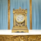 A LATE 19TH CENTURY NIELLO ENAMEL AND SILVERED AND GILT BRONZE MANTEL CLOCK