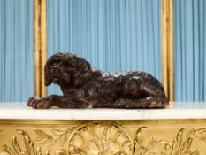 A LATE 19TH CENTURY BLACK FOREST CARVED WOOD MODEL OF A DOG