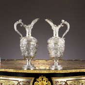 AN EXCEPTIONAL PAIR OF VICTORIAN STERLING SILVER CELLINI CLARET JUGS, LONDON, 1875