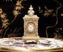 AN EARLY 20TH CENTURY FRENCH CHAMPLEVE ENAMEL CLOCK FOR THE MIDDLE EASTERN MARKET