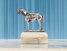 A SILVER MODEL OF A HORSE C. 1933 BY GOLDSMITHS & SILVERSMITHS CO LTD.