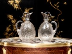A PAIR OF VICTORIAN STERLING SILVER AND CUT GLASS CLARET JUGS, 1893, MAPPIN & WEBB