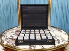 A CASED SET OF TWENTY FOUR STERLING SILVER NAPKIN RINGS, BIRMINGHAM, 1977