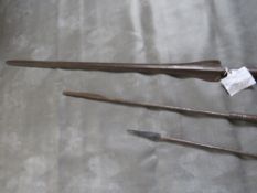 A MASAI LION HUNTING SPEAR, with long iron tips and central wooden grip, along with two smaller