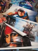 A collection of assorted rolled film posters to include Avatar, Pirates of the Caribbean etc……. (5)