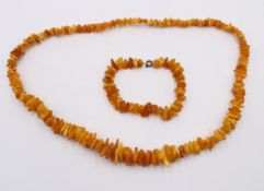 Set, Bernstein, Kette und Armband, Kette endlos, Armband ca. L-21cm, zus. 56,1gr.